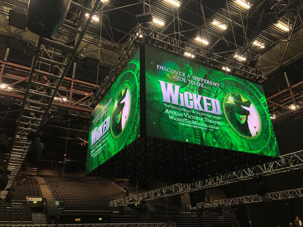 Flown LED cube in an arena