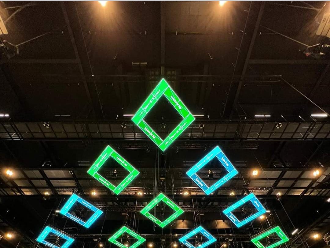 Flown LED frames over an arena floor