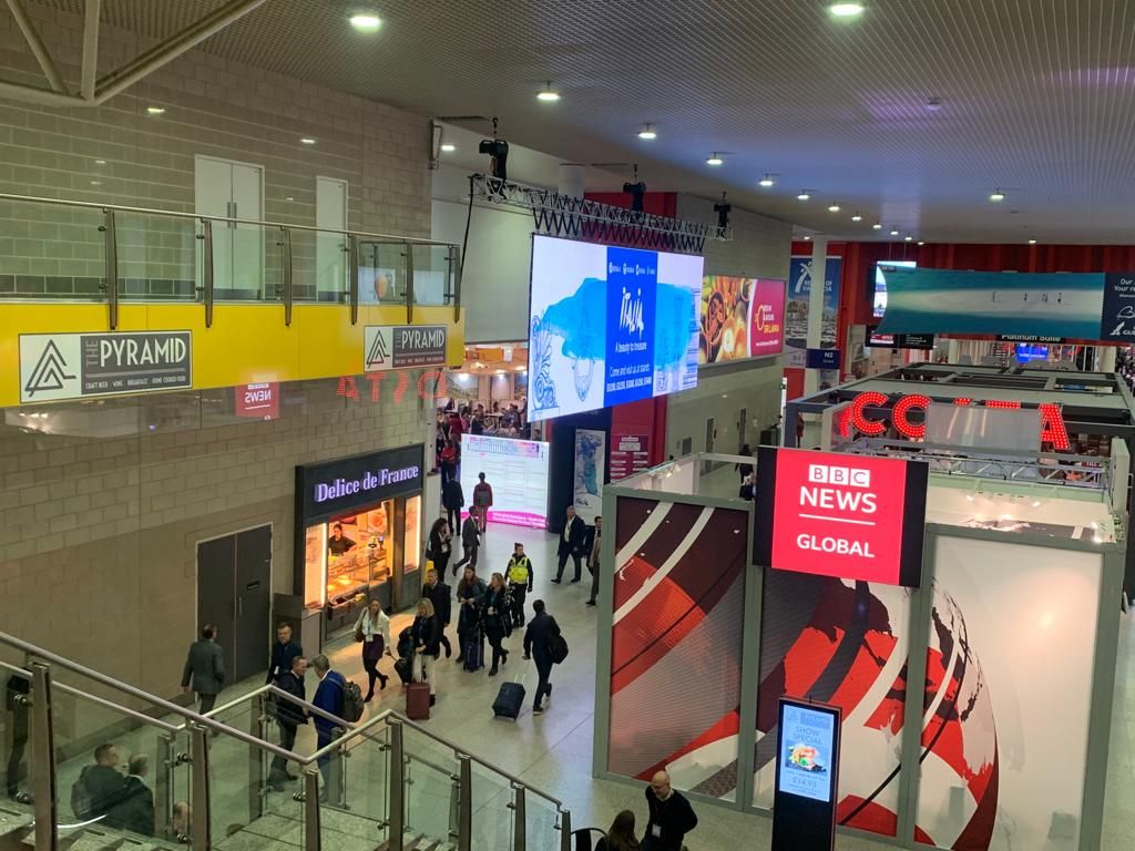 Flown LED screen over the ExCeL concourse