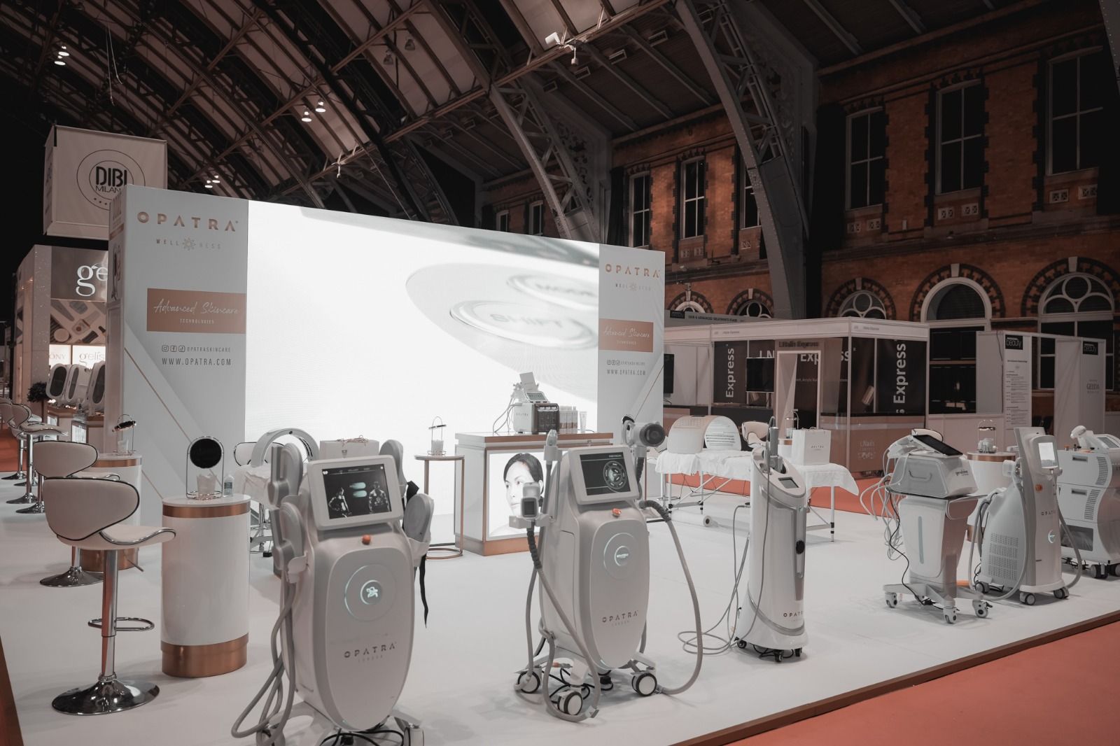 Screens on a product stand, Olympia