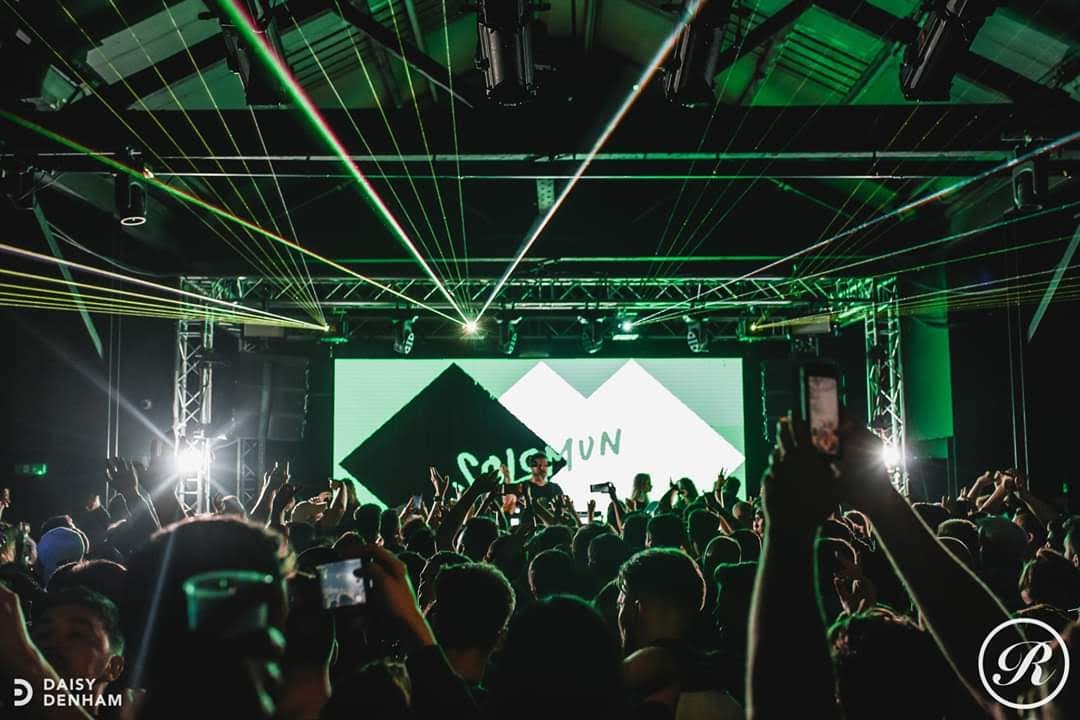 DJ stage LED wall under lasers